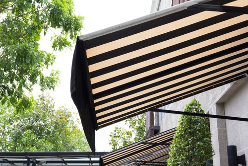 When to Choose Fixed Awnings Over Retractable Ones